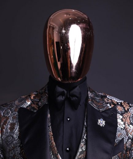A knitted, brown, silver and black floral jacquard peak lapel suit