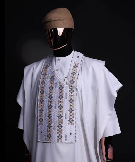 A white, shattered interwoven embroidery with Swarovski stones details agbada