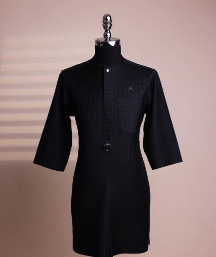 A black pencil stripe, mug-shaped pocket, front flap with buckle strap and silver Swarovski button, 3/4 sleeve African senator kaftan.