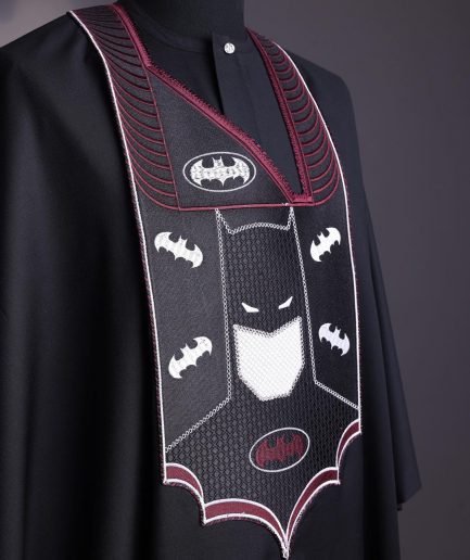 A charcoal black, “Batman VS Gotham” embroidery details agbada