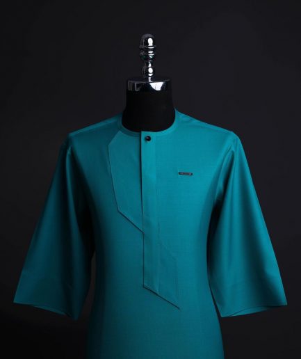 A Castleton green, front flap, patterned flap with black Swarovski button, short sleeve African senator kaftan native.