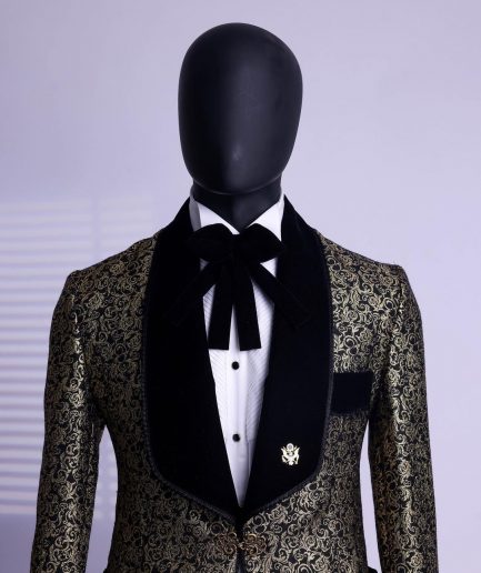 A Gold and black patterned metallic Jacquard tuxedo suit with sharaba wooven edge detailing