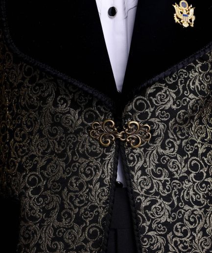A Gold and black patterned metallic Jacquard tuxedo suit with sharaba wooven edge detailing