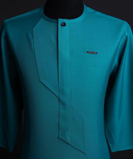 A Castleton green, front flap, patterned flap with black Swarovski button, short sleeve African senator kaftan native.