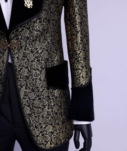 A Gold and black patterned metallic Jacquard tuxedo suit with sharaba wooven edge detailing
