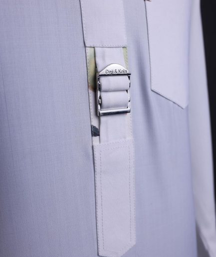 A White, front flap,interwoven buckle, Long sleeve African senator kaftan native.