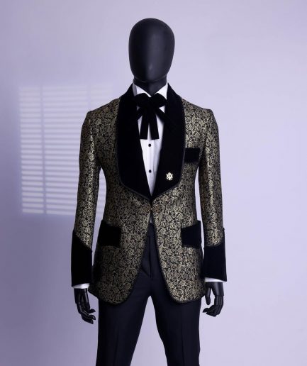A Gold and black patterned metallic Jacquard tuxedo suit with sharaba wooven edge detailing