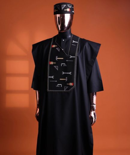 A Charcoal Black, “ise ni ogun ise” - work is the antidote of poverty - pattern embroidery details agbada, 3/4 sleeve kaftan & sokoto