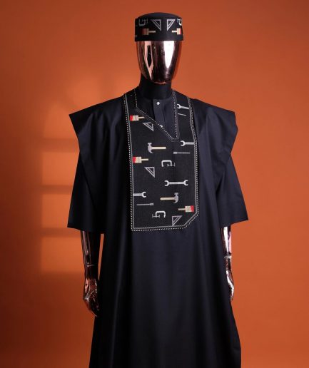 A Charcoal Black, “ise ni ogun ise” - work is the antidote of poverty - pattern embroidery details agbada, 3/4 sleeve kaftan & sokoto