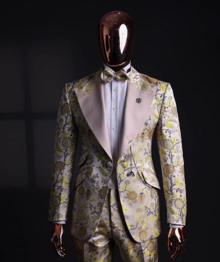 A Floral splashed yellow, mocha and cedar brown, knitted, peak lapel tuxedo suit
