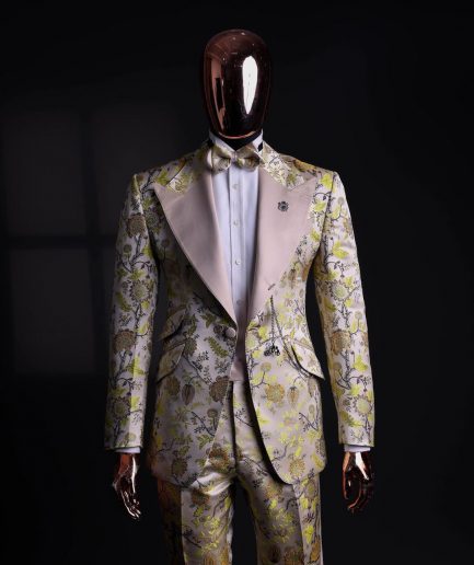 A Floral splashed yellow, mocha and cedar brown, knitted, peak lapel tuxedo suit