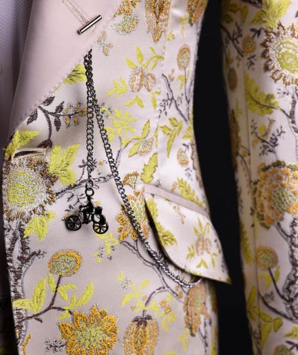A Floral splashed yellow, mocha and cedar brown, knitted, peak lapel tuxedo suit
