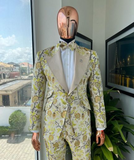 A Floral splashed yellow, mocha and cedar brown, knitted, peak lapel tuxedo suit