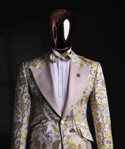 A Floral splashed yellow, mocha and cedar brown, knitted, peak lapel tuxedo suit