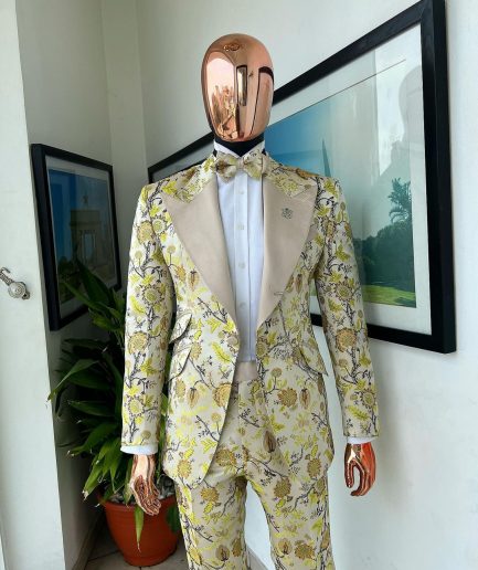 A Floral splashed yellow, mocha and cedar brown, knitted, peak lapel tuxedo suit