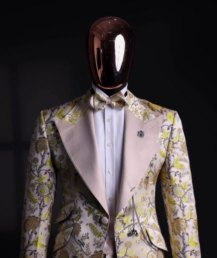 A Floral splashed yellow, mocha and cedar brown, knitted, peak lapel tuxedo suit