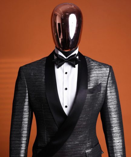 A wire metallic silver and black jacquard, lower cut, wrap shawl lapel tuxedo suit
