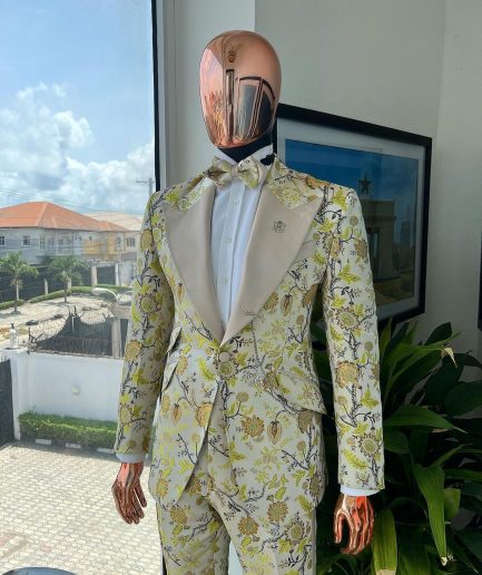 A Floral splashed yellow, mocha and cedar brown, knitted, peak lapel tuxedo suit