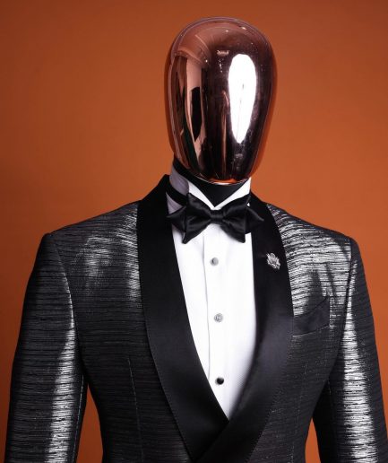 A wire metallic silver and black jacquard, lower cut, wrap shawl lapel tuxedo suit