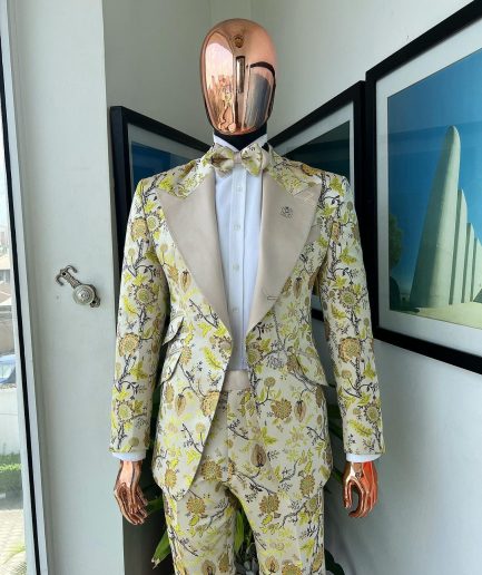 A Floral splashed yellow, mocha and cedar brown, knitted, peak lapel tuxedo suit