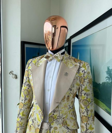 A Floral splashed yellow, mocha and cedar brown, knitted, peak lapel tuxedo suit