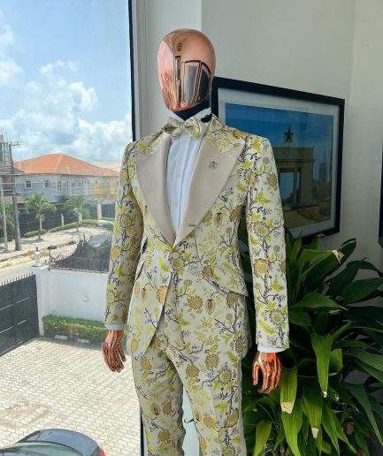 A Floral splashed yellow, mocha and cedar brown, knitted, peak lapel tuxedo suit