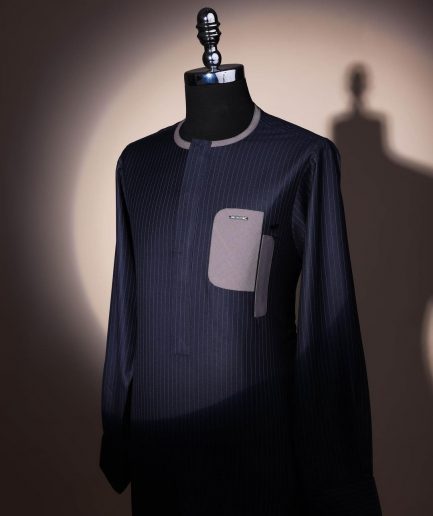 A black pencil stripe, dropping pocket, front flap, long sleeve African senator kaftan native.