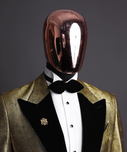 A gold metallic jacquard peak lapel tuxedo suit