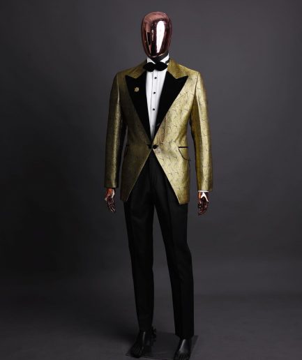 A gold metallic jacquard peak lapel tuxedo suit