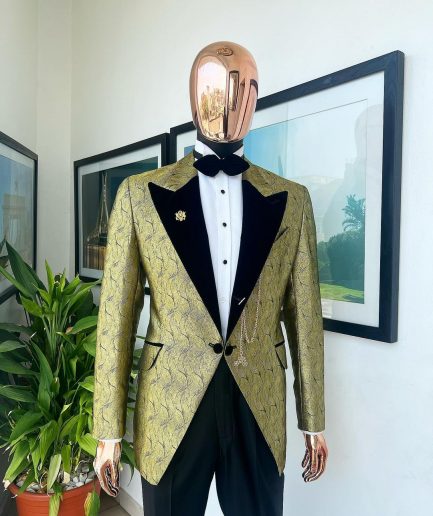 A gold metallic jacquard peak lapel tuxedo suit