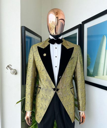 A gold metallic jacquard peak lapel tuxedo suit