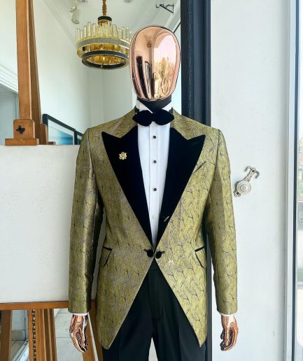A gold metallic jacquard peak lapel tuxedo suit