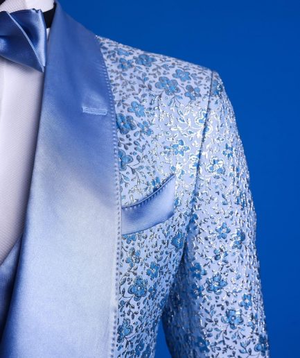 An Azure blue, knitted, star studded metallic jacquard, shawl lapel tuxedo suit.