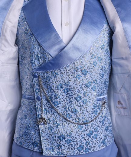 An Azure blue, knitted, star studded metallic jacquard, shawl lapel tuxedo suit.