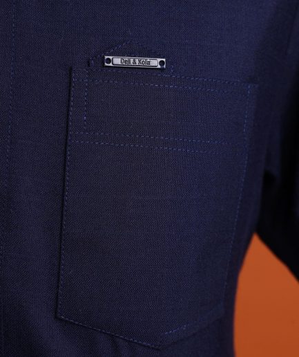 A Jorgecarli wool, midnight blue, invisible windowpane check, front flap with silver Swarovski button, shorts sleeve African senator kaftan native.