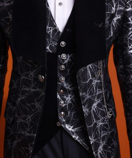 A charcoal black and silver spiral jacquard, shawl lapel tuxedo suit