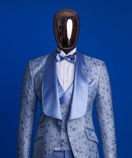An Azure blue, knitted, star studded metallic jacquard, shawl lapel tuxedo suit.