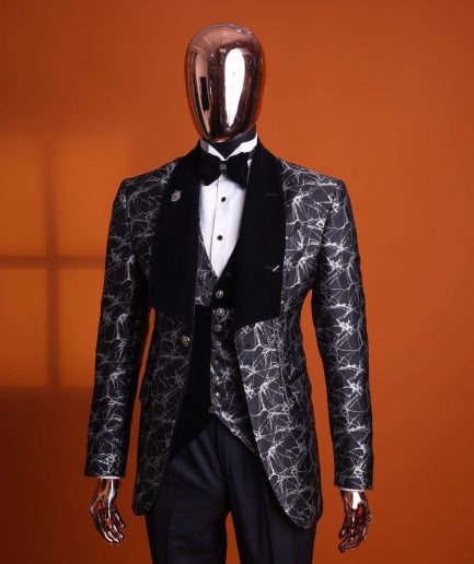 A charcoal black and silver spiral jacquard, shawl lapel tuxedo suit