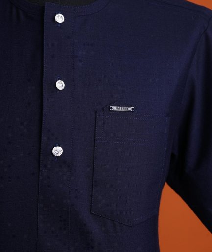 A Jorgecarli wool, midnight blue, invisible windowpane check, front flap with silver Swarovski button, shorts sleeve African senator kaftan native.