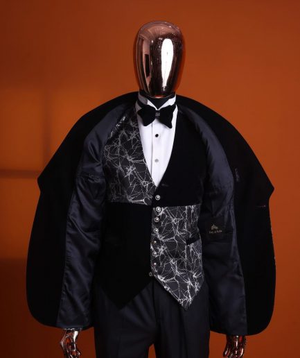 A charcoal black and silver spiral jacquard, shawl lapel tuxedo suit