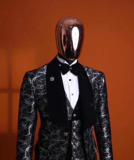 A charcoal black and silver spiral jacquard, shawl lapel tuxedo suit