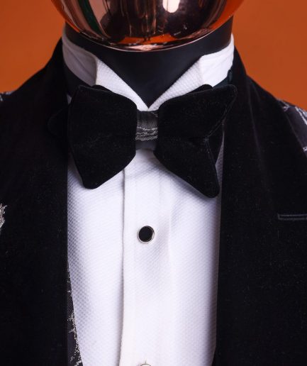 A charcoal black and silver spiral jacquard, shawl lapel tuxedo suit