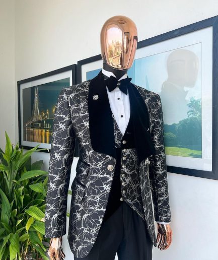 A charcoal black and silver spiral jacquard, shawl lapel tuxedo suit