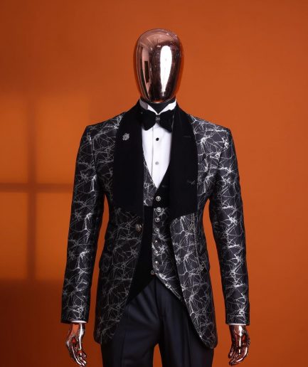 A charcoal black and silver spiral jacquard, shawl lapel tuxedo suit
