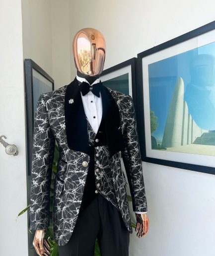 A charcoal black and silver spiral jacquard, shawl lapel tuxedo suit
