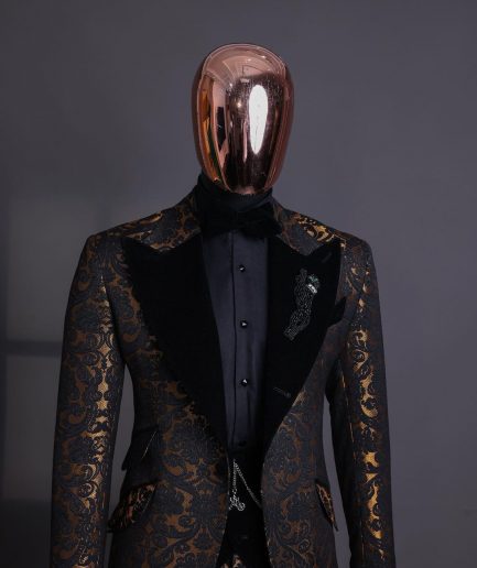 A Gold and black mandarin metallic floral jacquard, peak lapel tuxedo suit.