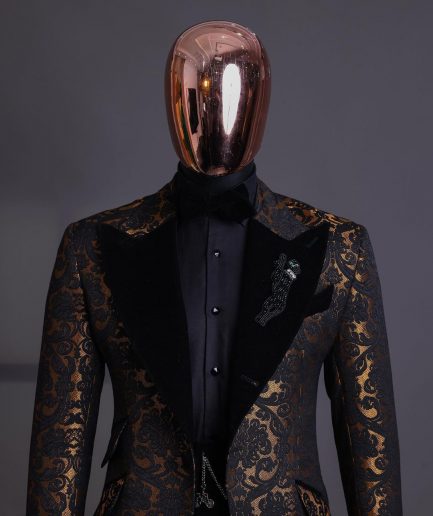 A Gold and black mandarin metallic floral jacquard, peak lapel tuxedo suit.