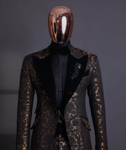 A Gold and black mandarin metallic floral jacquard, peak lapel tuxedo suit.
