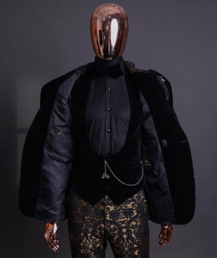 A Gold and black mandarin metallic floral jacquard, peak lapel tuxedo suit.