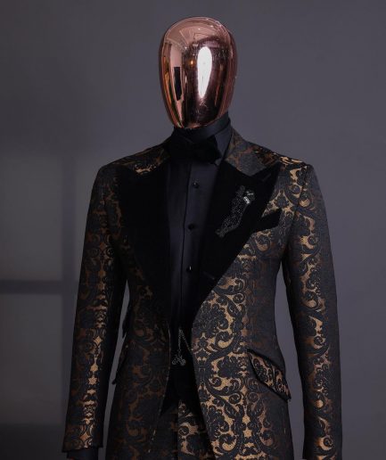 A Gold and black mandarin metallic floral jacquard, peak lapel tuxedo suit.